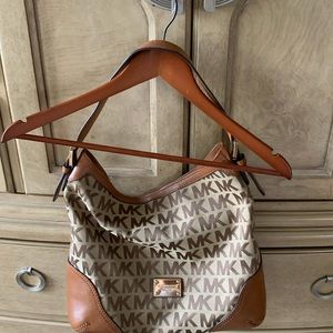 Michael Kors purse good condition with MK logo tan & brown